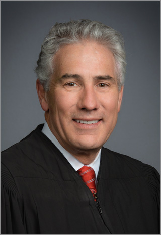 Honorable Michael R. Bluff